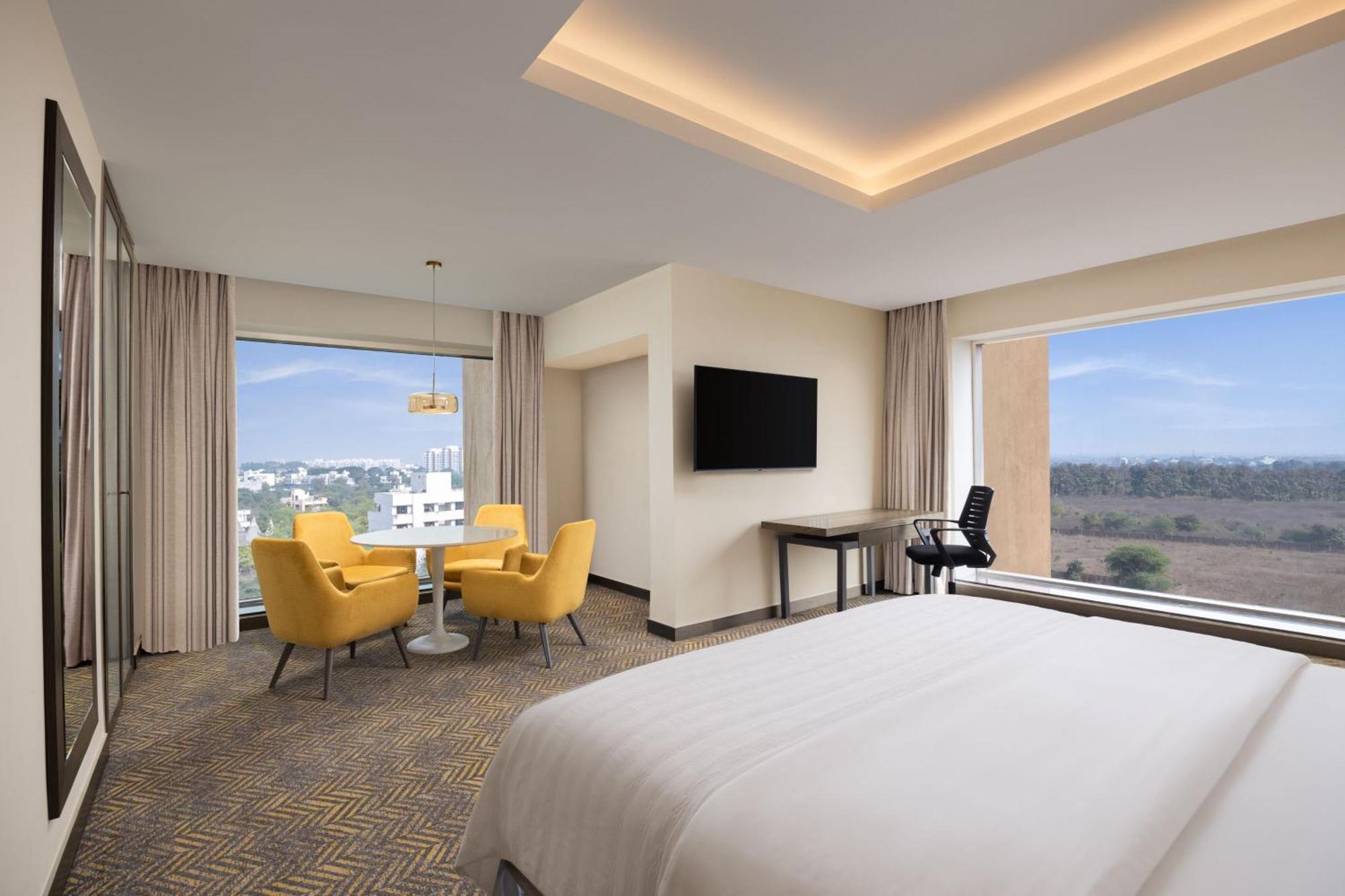 Superior King Room City View Club Lounge Access from 7pm 9pm complimentary house selection of liquor I 2 pints of beer 2 pieces of laundry per on non-cumulative basis
