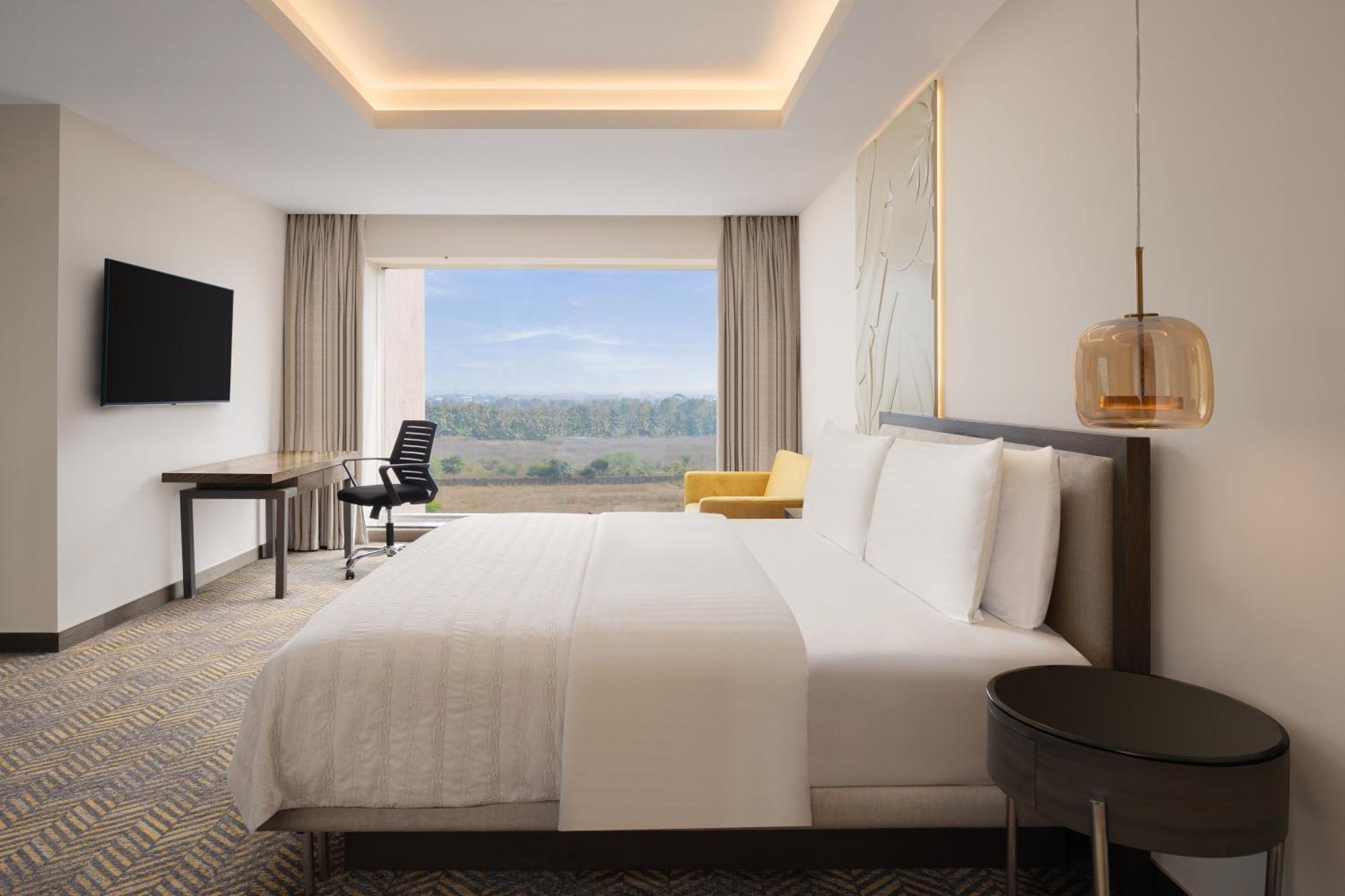 Superior King Room City View Club Lounge Access from 7pm 9pm complimentary house selection of liquor I 2 pints of beer 2 pieces of laundry per on non-cumulative basis