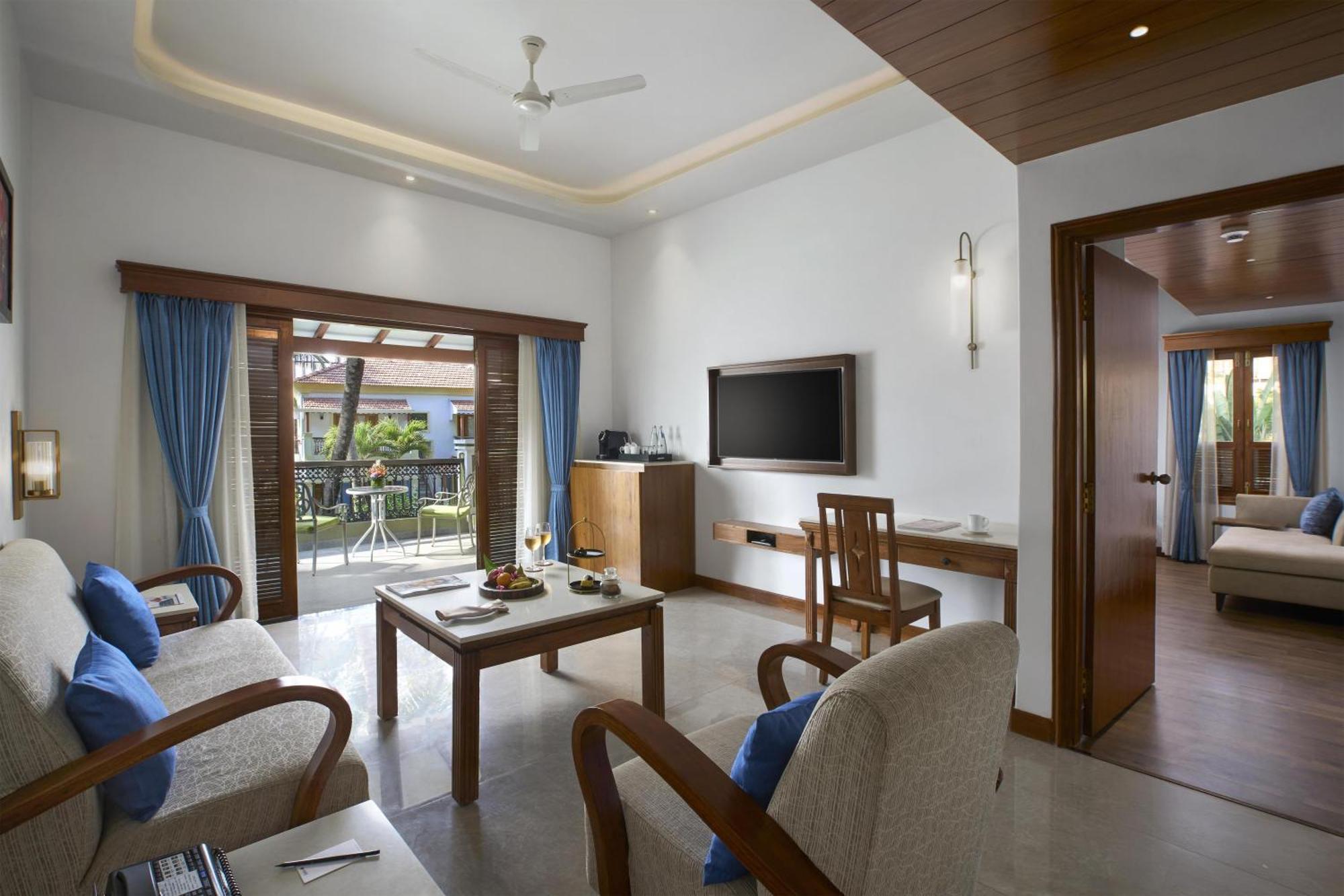 Radisson Suite Balcony Bathtub Living room & Garden view of Food & Beverages SPA 1 Goan Bottle INR 500 Hotel Credit spend of INR 5000 Early Check upto 2 hours subject