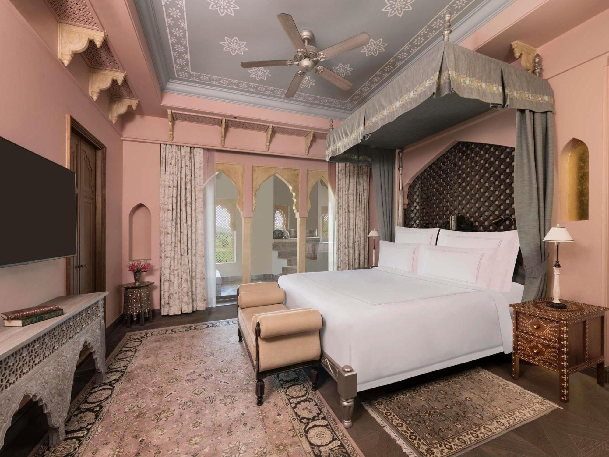 Raffles King Bedroom Suite Plunge Pool & Balcony Enjoy savings on F&B Spa Laundry one way airport transfer along one Jaipur Sling & Mineral Pool Experience Unwind the Raffles Suite a spacious luxurious bathroom balc