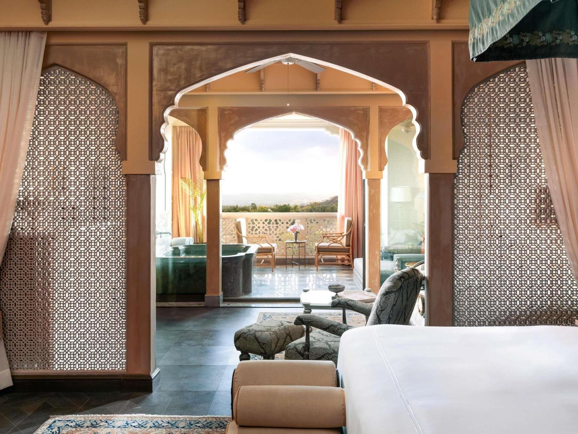 Landmark Room King Bed Enjoy INR 3000 daily dining credit your where Rajasthani craftsmanship meets contemporary elegance Unwind a spacious bathroom balcony daybed private outdoor bath overlooking the Aravalli Hills