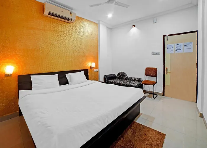 Capital O Convivial Hotel Amit Regency